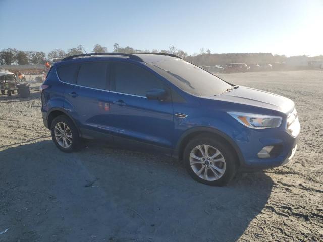 Photo 4 from auction – 2018 FORD ESCAPE SE with VIN 1FMCU0GD8JUC62381