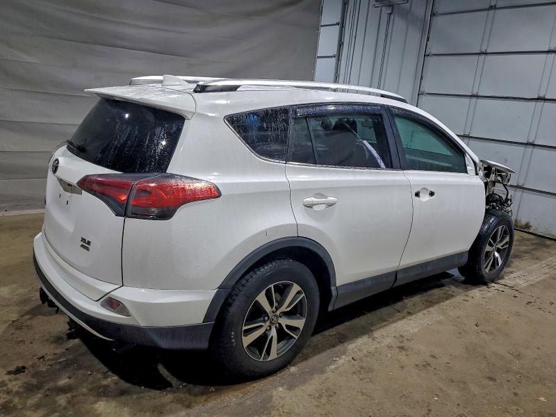 Photo 3 from auction – 2016 TOYOTA RAV4 XLE with VIN 2T3RFREV1GW456478
