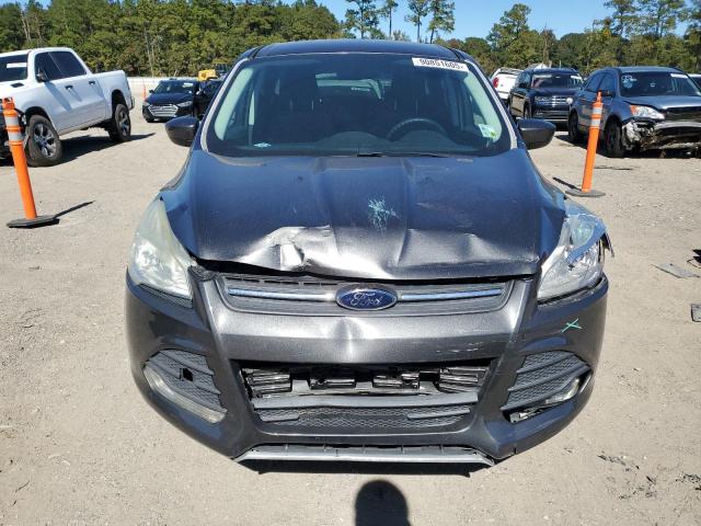 Photo 5 from auction – 2016 FORD ESCAPE SE with VIN 1FMCU9GX2GUA34335