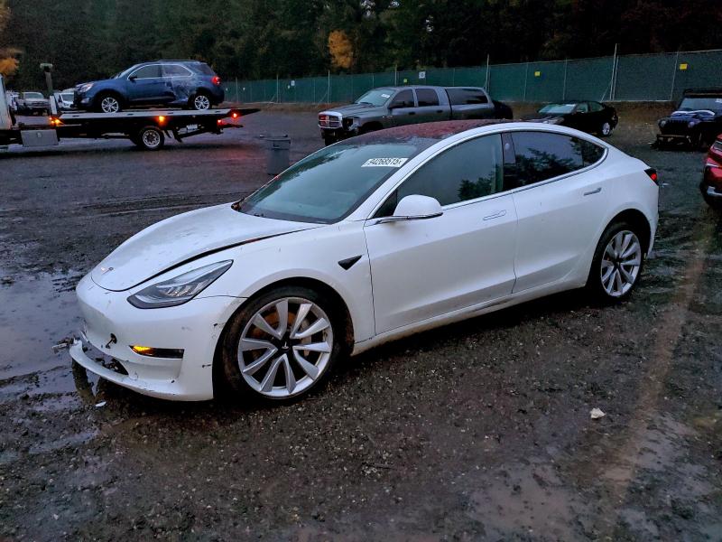 TESLA MODEL 3 2018 with VIN 5YJ3E1EA0JF003831 - Photo from auction