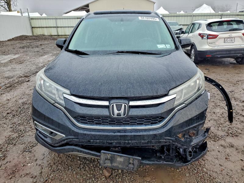 Photo 5 from auction – 2015 HONDA CR-V EXL with VIN 2HKRM4H75FH671745