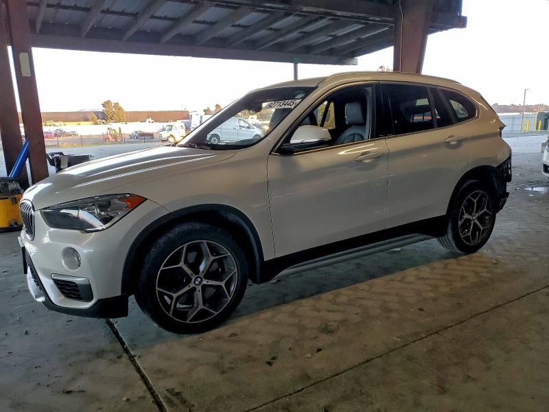 BMW X1 SDRIVE2 2018 with VIN WBXHU7C36J5L09744 - Photo from auction