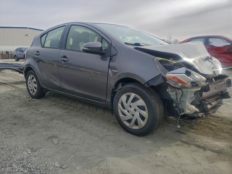 Photo 4 from auction – 2015 TOYOTA PRIUS C with VIN JTDKDTB38F1107029