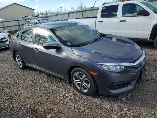 Photo 4 from auction – 2018 HONDA CIVIC LX with VIN 2HGFC2F59JH568083