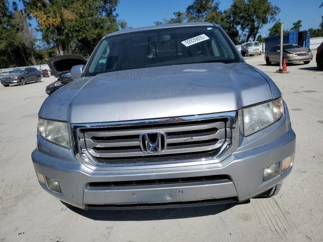 Photo 5 from auction – 2013 HONDA RIDGELINE with VIN 5FPYK1F52DB009979
