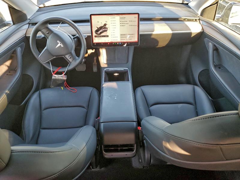 Photo 8 from auction – 2023 TESLA MODEL Y with VIN 7SAYGDED5PF976906