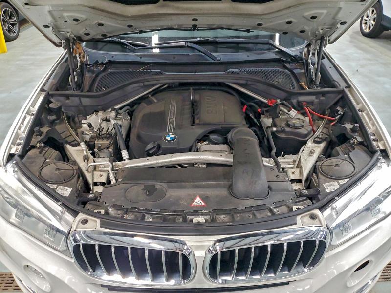 Photo 12 from auction – 2015 BMW X5 XDRIVE3 with VIN 5UXKR0C52F0K63359