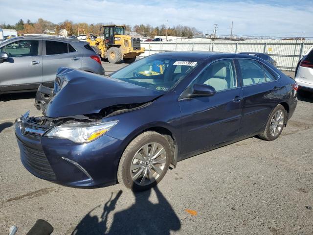 TOYOTA CAMRY LE 2017 with VIN 4T1BF1FK0HU734353 - Photo from auction