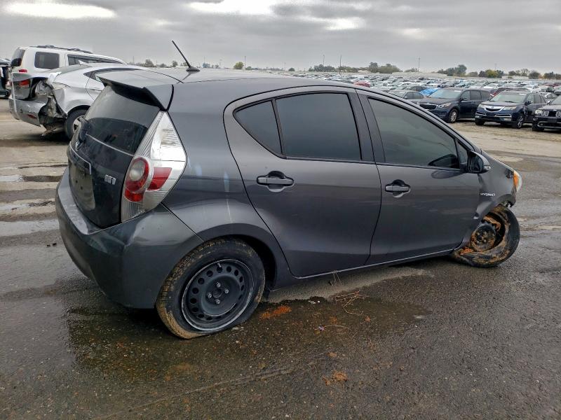Photo 3 from auction – 2014 TOYOTA PRIUS C with VIN JTDKDTB37E1084504