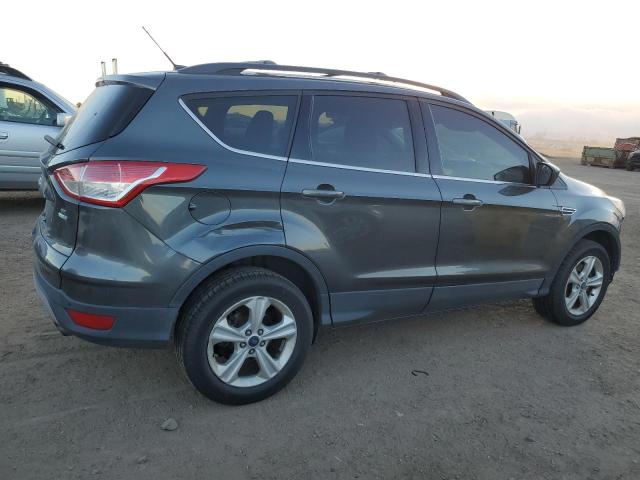 Photo 3 from auction – 2016 FORD ESCAPE SE with VIN 1FMCU9GX7GUB50372