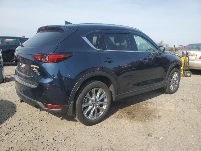 Photo 3 from auction – 2021 MAZDA CX-5 GRAND with VIN JM3KFBAY5M0351409