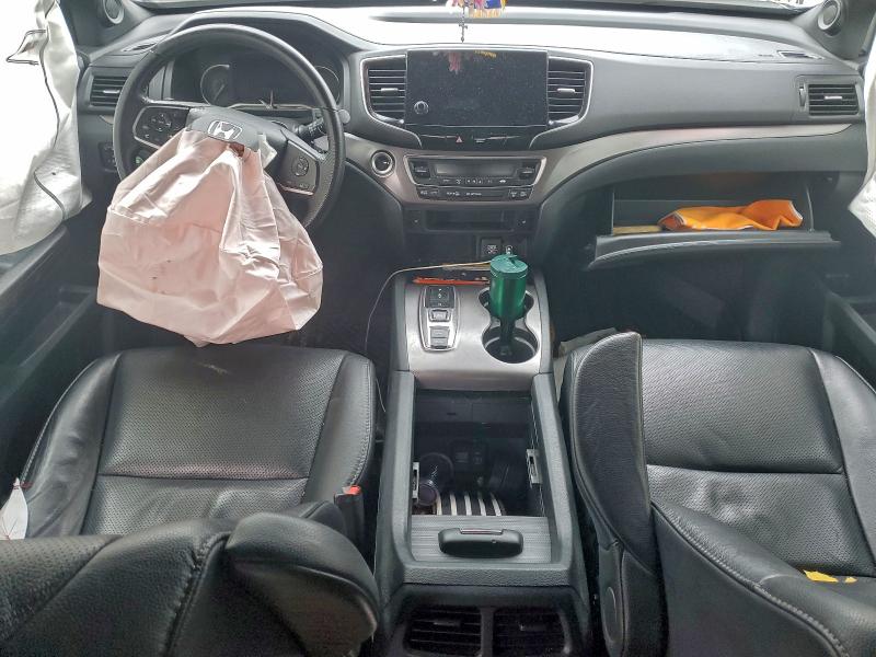 Photo 8 from auction – 2023 HONDA PASSPORT E with VIN 5FNYF8H53PB038253