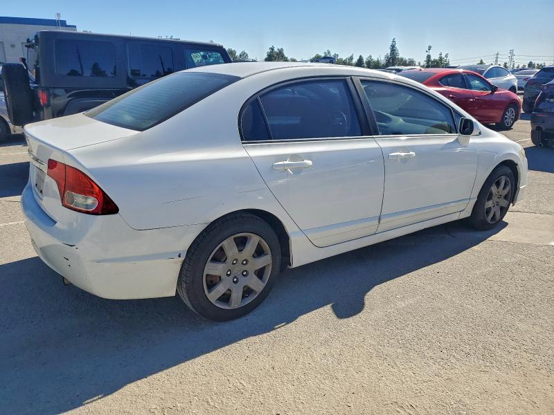 Photo 3 from auction – 2010 HONDA CIVIC LX with VIN 19XFA1F57AE049088