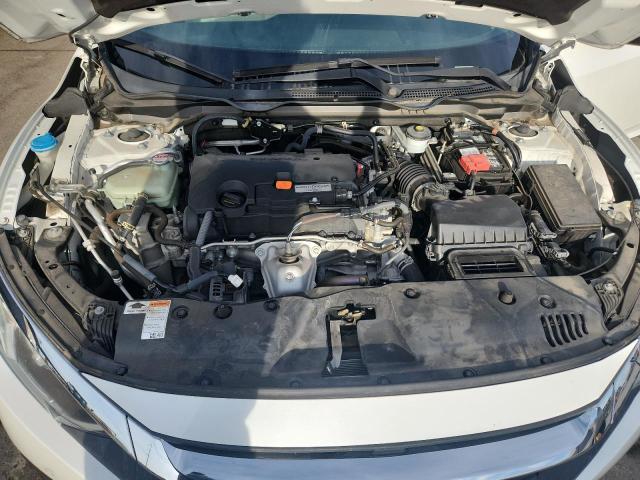 Photo 11 from auction – 2018 HONDA CIVIC EX with VIN 19XFC2F74JE006040