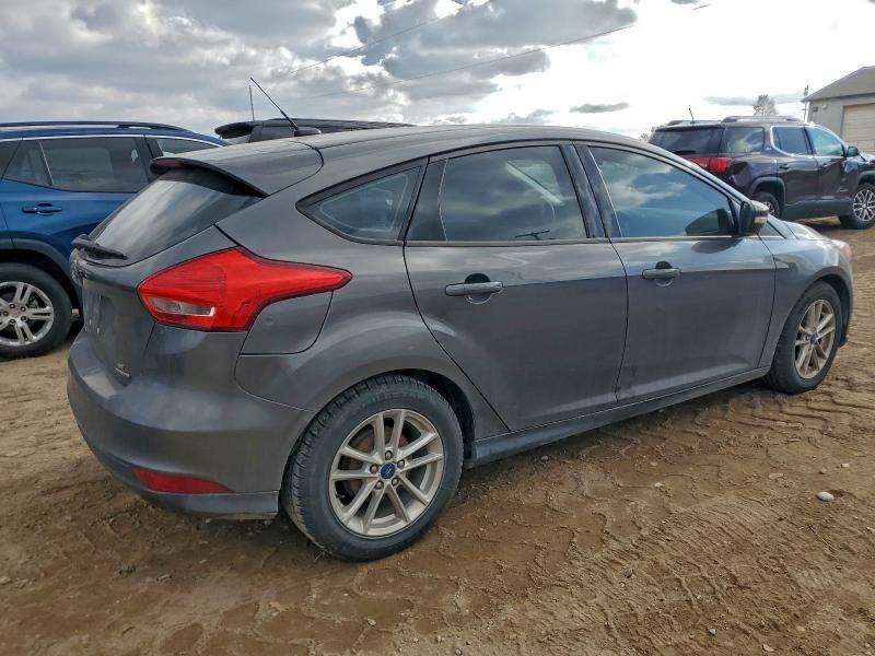 Photo 3 from auction – 2015 FORD FOCUS SE with VIN 1FADP3K20FL379527