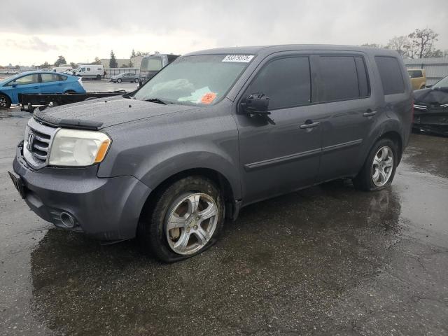 HONDA PILOT EXL 2015 with VIN 5FNYF4H52FB021161 - Photo from auction