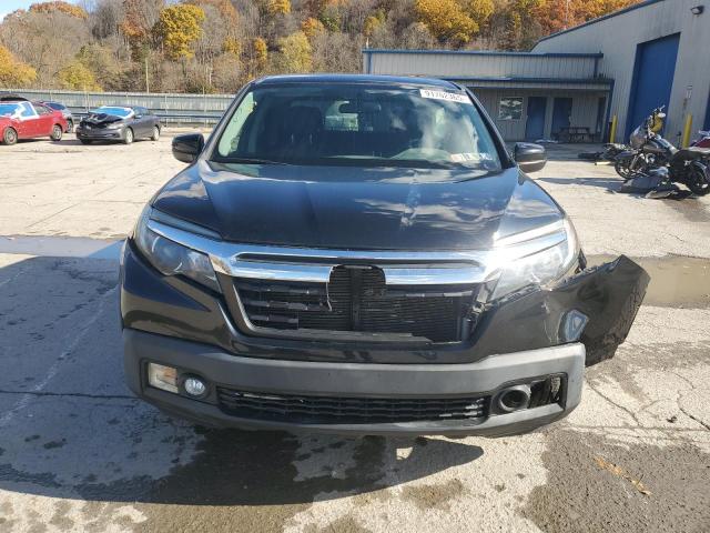 Photo 5 from auction – 2017 HONDA RIDGELINE with VIN 5FPYK3F5XHB007513
