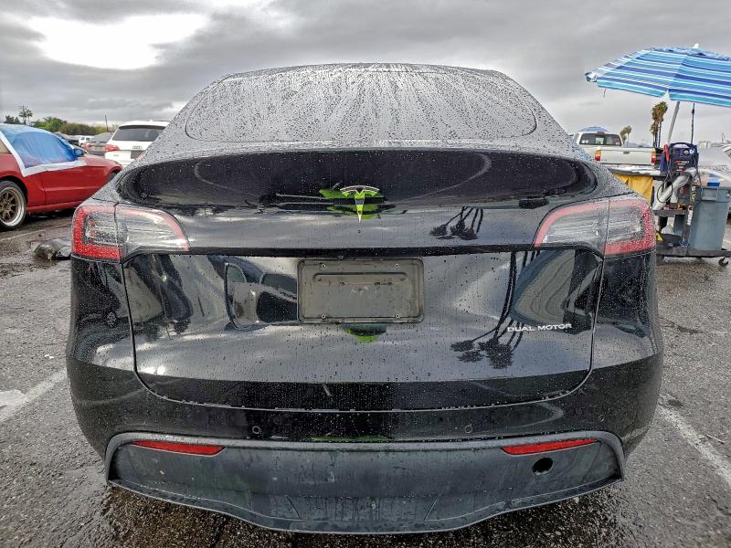 Photo 6 from auction – 2022 TESLA MODEL Y with VIN 7SAYGAEE8NF389698