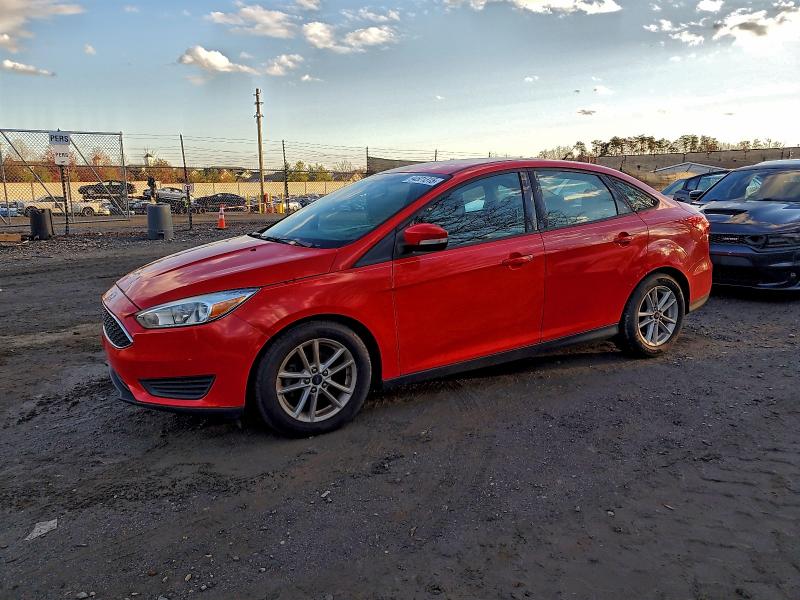 FORD FOCUS SE 2015 with VIN 1FADP3F26FL307869 - Photo from auction