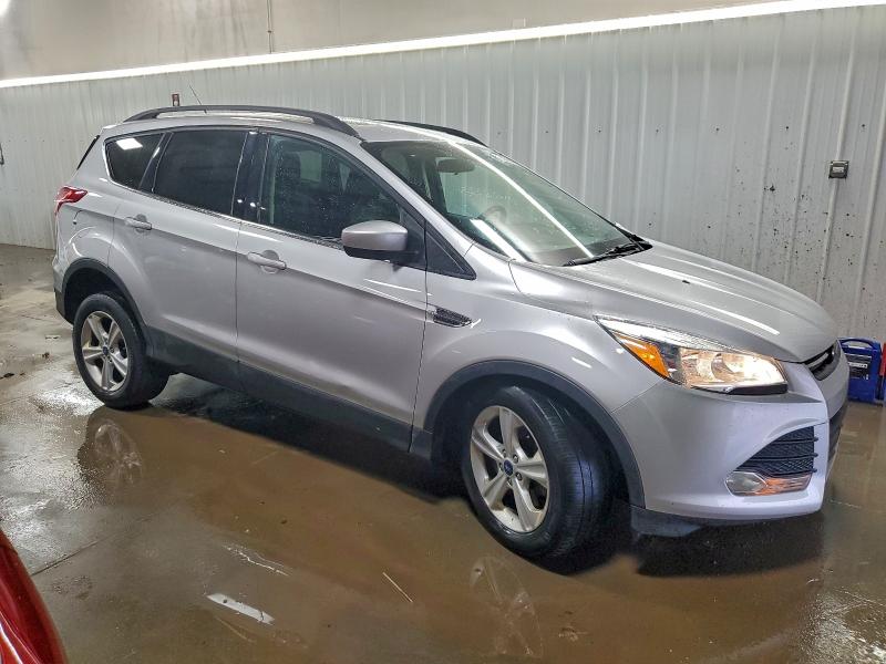 Photo 4 from auction – 2015 FORD ESCAPE SE with VIN 1FMCU9GXXFUC86445