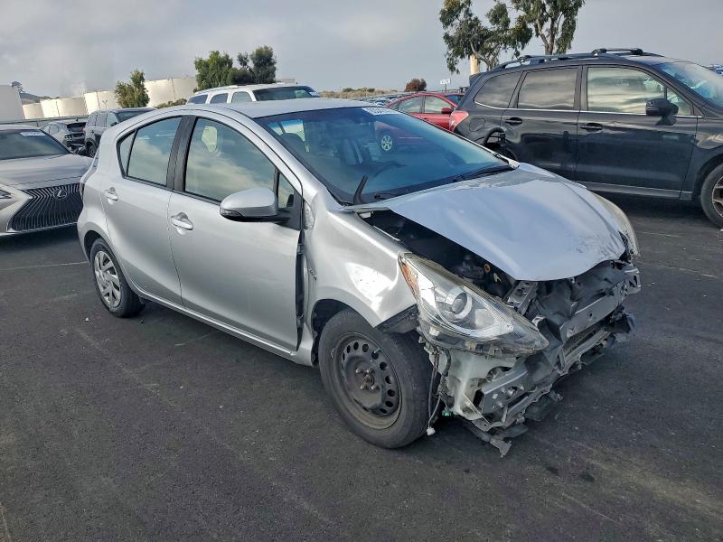 Photo 4 from auction – 2015 TOYOTA PRIUS C with VIN JTDKDTB33F1107570