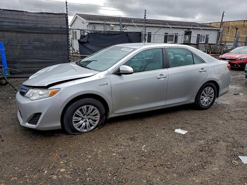 TOYOTA CAMRY HYBR 2012 with VIN 4T1BD1FK9CU060802 - Photo from auction