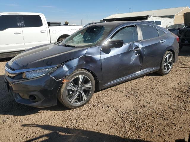 HONDA CIVIC TOUR 2016 with VIN 19XFC1F92GE034259 - Photo from auction