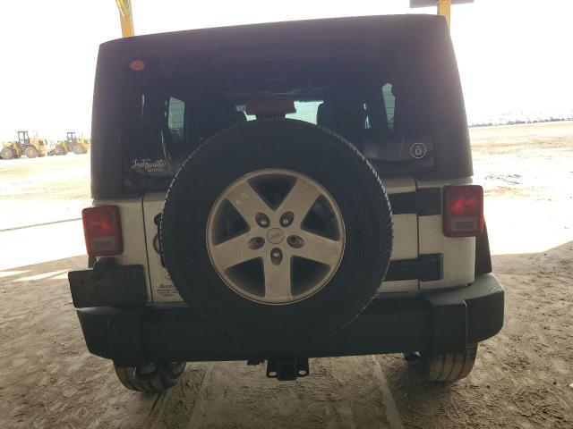 Photo 6 from auction – 2012 JEEP WRANGLER U with VIN 1C4BJWDG4CL214489