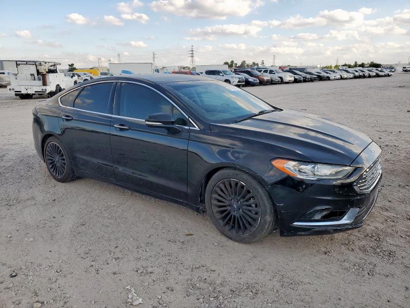 Photo 4 from auction – 2017 FORD FUSION TIT with VIN 3FA6P0K97HR130442