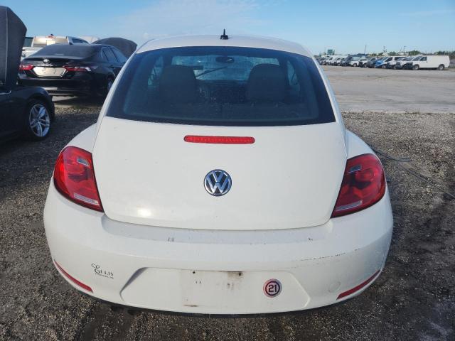 Photo 6 from auction – 2013 VOLKSWAGEN BEETLE with VIN 3VWFP7AT9DM645933