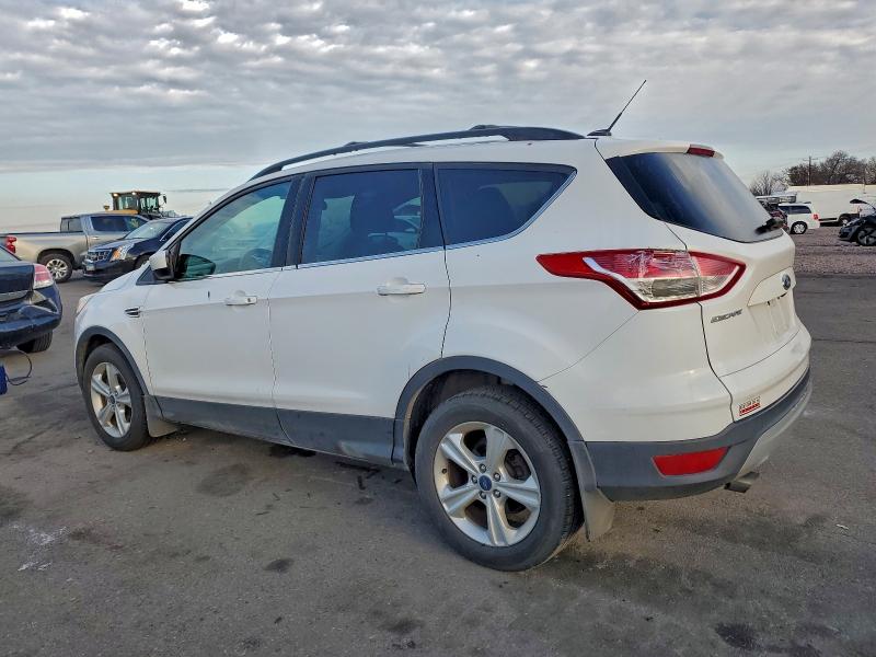 Photo 2 from auction – 2015 FORD ESCAPE SE with VIN 1FMCU9GX0FUA54632