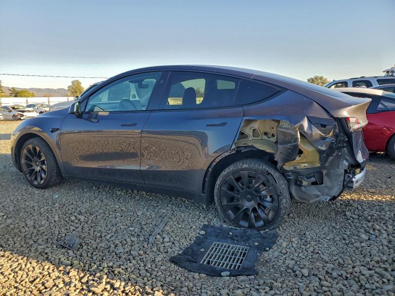 Photo 2 from auction – 2023 TESLA MODEL Y with VIN 7SAYGDED5PF976906