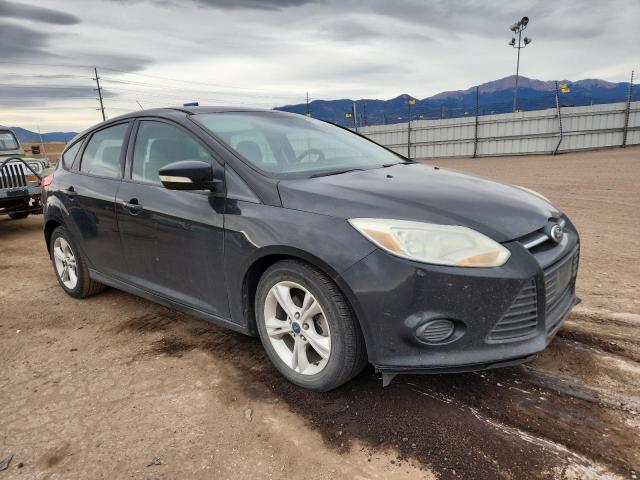 Foto 4 de la subasta – 2014 FORD FOCUS SE con VIN 1FADP3K29EL443739