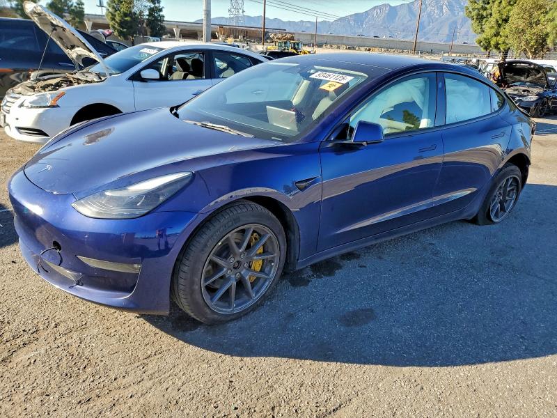 TESLA MODEL 3 2022 with VIN 5YJ3E1EB6NF335593 - Photo from auction