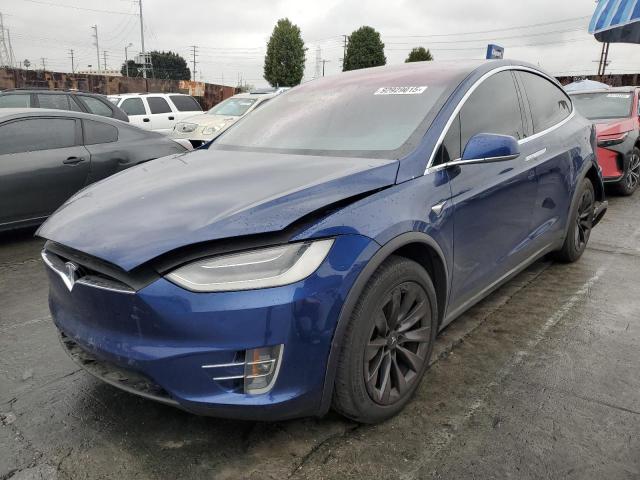 TESLA MODEL X 2019 with VIN 5YJXCDE29KF184382 - Photo from auction