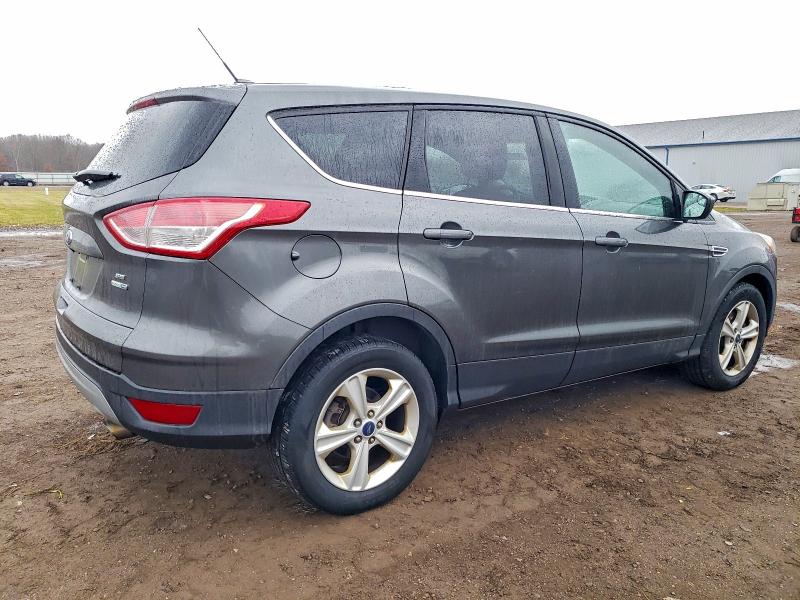Photo 3 from auction – 2016 FORD ESCAPE SE with VIN 1FMCU9GX2GUB80704
