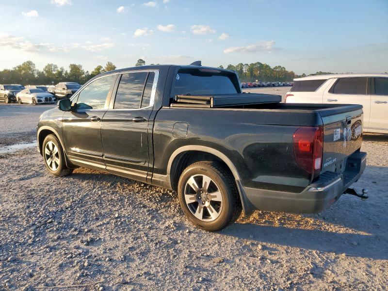 Photo 2 from auction – 2017 HONDA RIDGELINE with VIN 5FPYK2F66HB006247