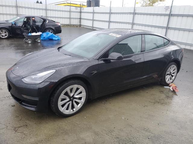 TESLA MODEL 3 2022 with VIN 5YJ3E1EA2NF288893 - Photo from auction