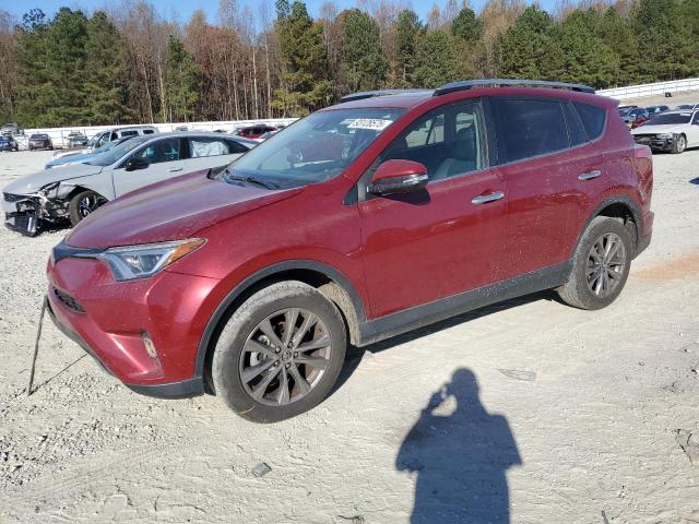 TOYOTA RAV4 LIMIT 2018 with VIN JTMDFREV6JD257084 - Photo from auction