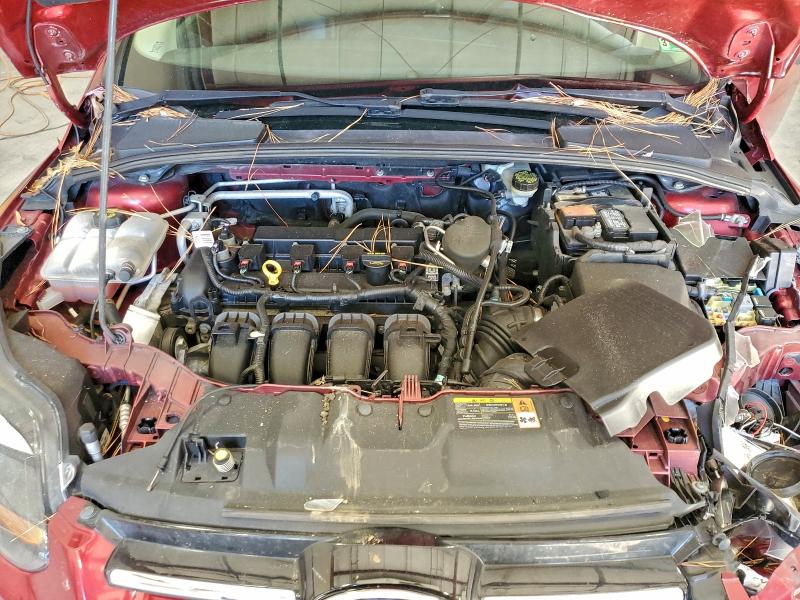 Photo 11 from auction – 2014 FORD FOCUS with VIN 1FADP3J21EL104555