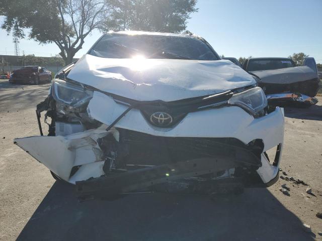 Photo 5 from auction – 2017 TOYOTA RAV4 XLE with VIN JTMWFREV5HD103128