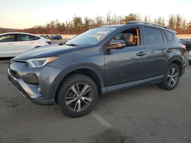 TOYOTA RAV4 XLE 2017 with VIN JTMRFREVXHJ114544 - Photo from auction