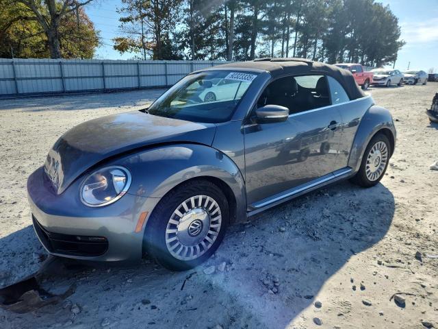 VOLKSWAGEN BEETLE 2014 with VIN 3VW5P7AT4EM801700 - Photo from auction