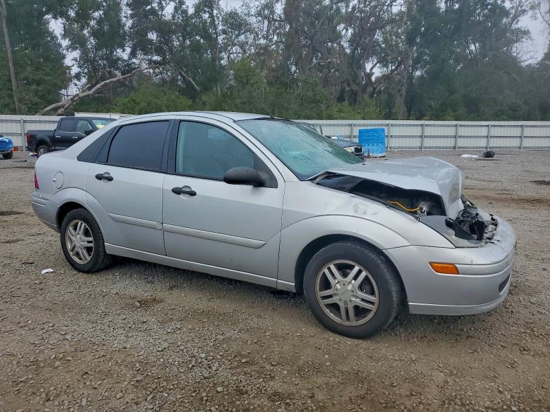 Photo 4 from auction – 2004 FORD FOCUS with VIN 1FAFP34334W138684