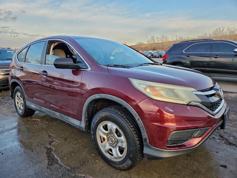 Photo 4 from auction – 2015 HONDA CR-V with VIN 2HKRM4H35FH629993