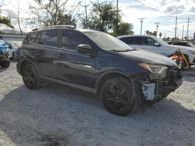 Photo 4 from auction – 2018 TOYOTA RAV4 LE with VIN JTMZFREV2JJ156566