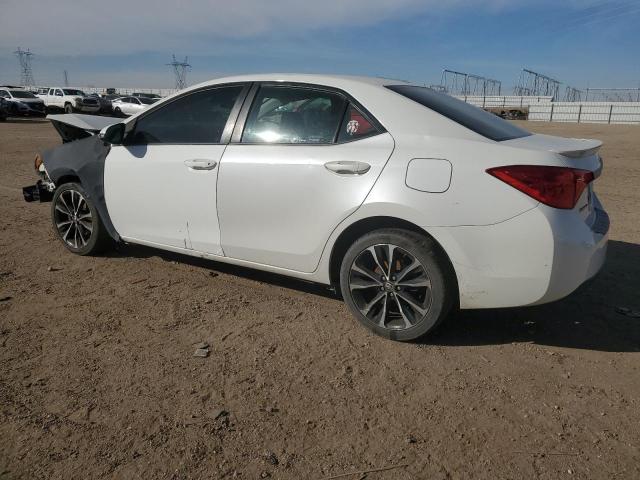Photo 2 from auction – 2018 TOYOTA COROLLA L with VIN 5YFBURHEXJP766620