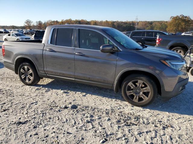 Photo 4 from auction – 2019 HONDA RIDGELINE with VIN 5FPYK2F57KB000679