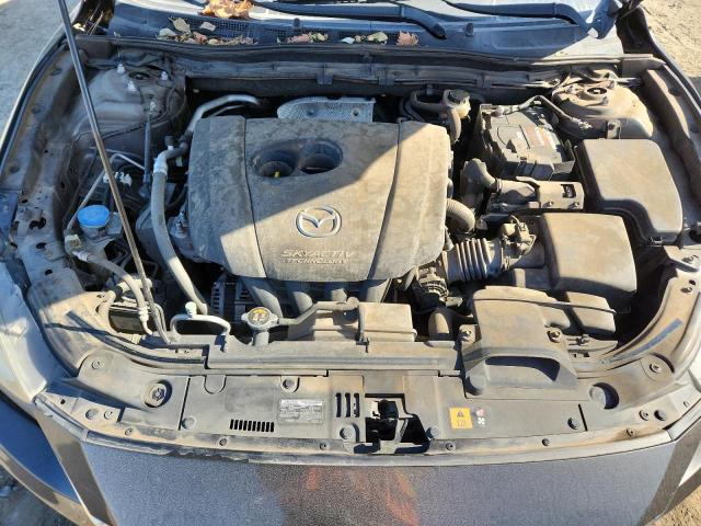 Photo 11 from auction – 2014 MAZDA 3 with VIN JM1BM1V7XE1112184