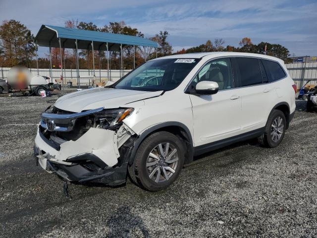 HONDA PILOT EXL 2020 with VIN 5FNYF5H53LB010154 - Photo from auction